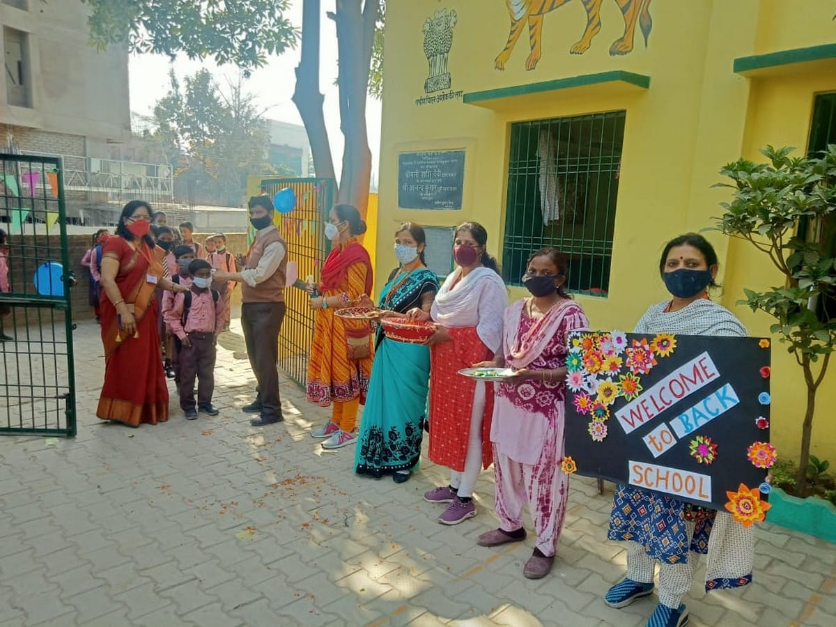 schools open after one year almost teachers welcome students in varanasi