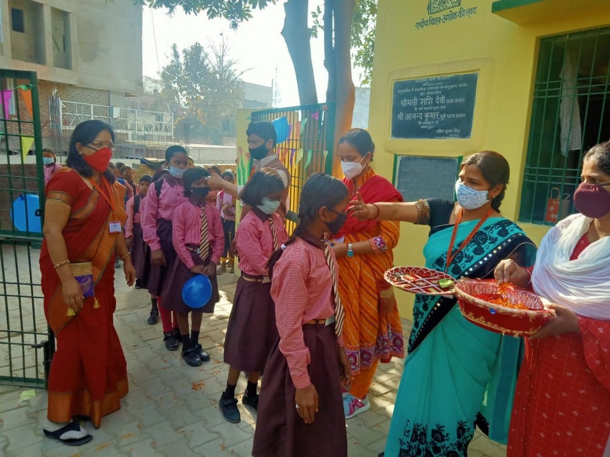 schools open after one year almost teachers welcome students in varanasi