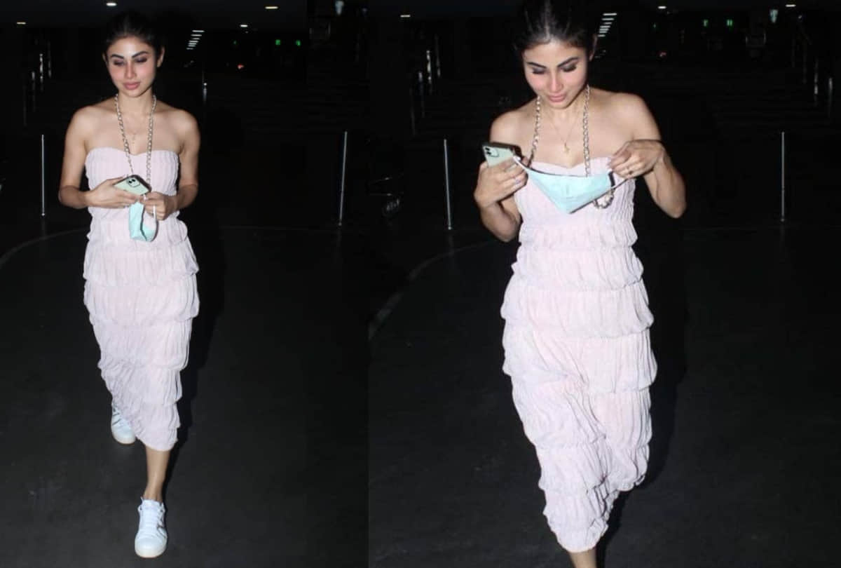 mouni roy mesmerize with beautiful look at airport wear pink off shoulder ruched dress