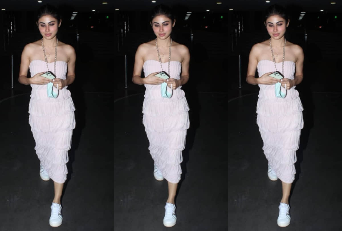 mouni roy mesmerize with beautiful look at airport wear pink off shoulder ruched dress
