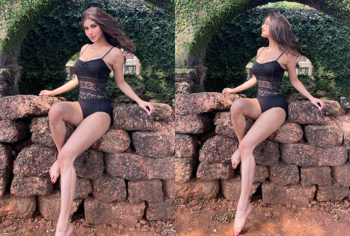 mouni roy mesmerize with beautiful look at airport wear pink off shoulder ruched dress