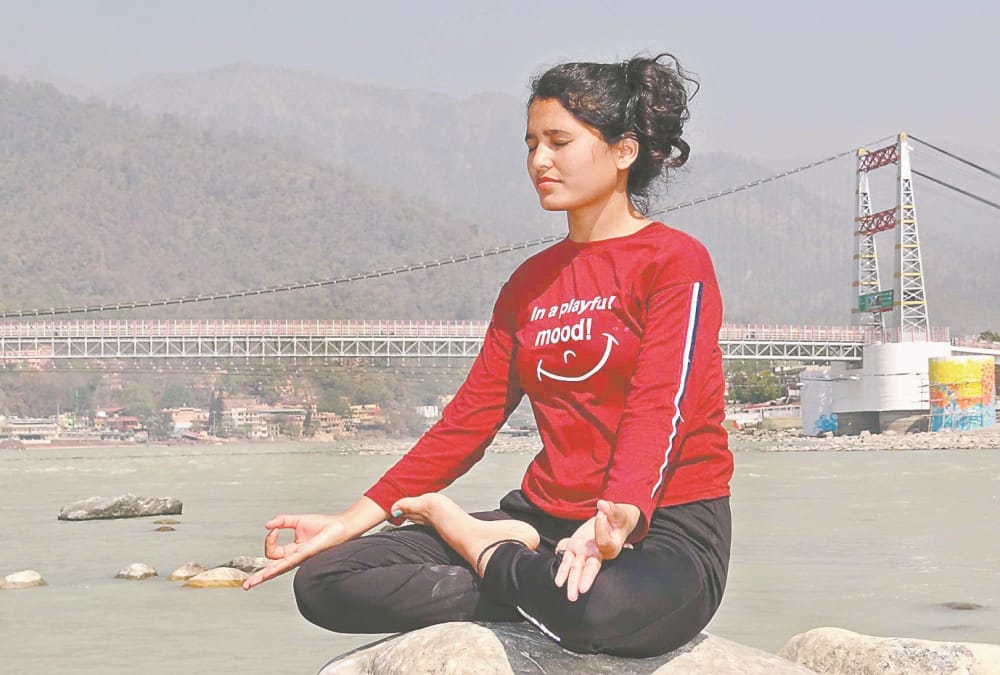 International Yoga Festival 202:  Usha Mata Gives Yoga tips To All Age Group Photos
