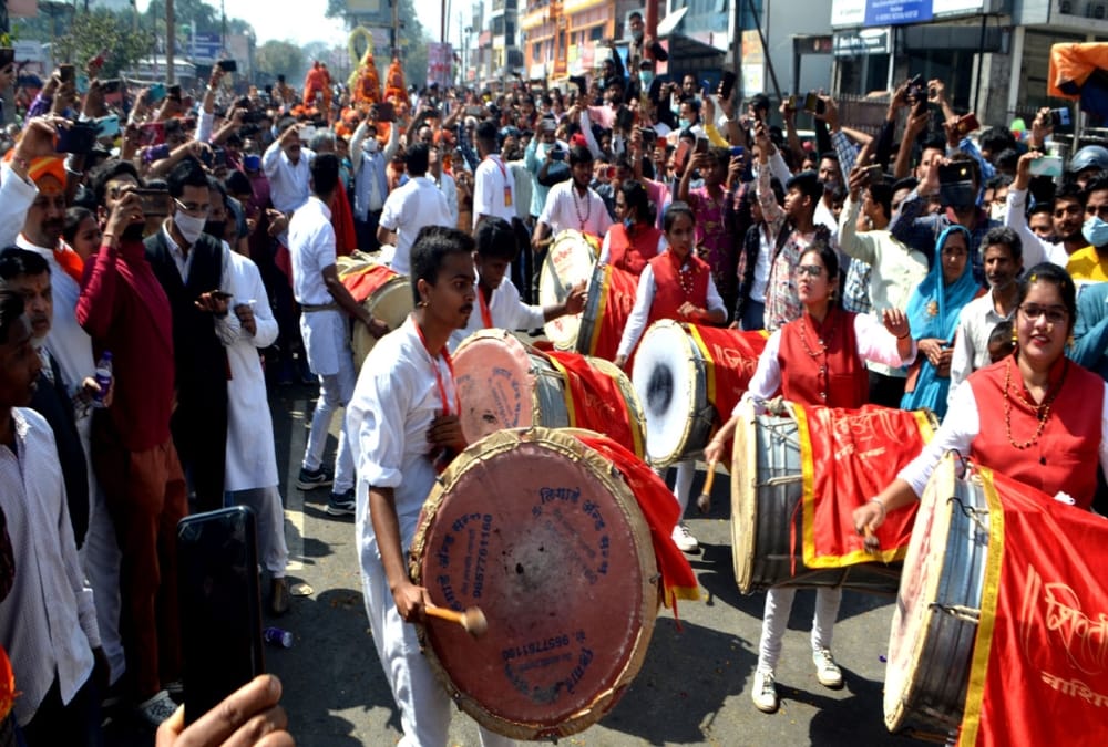Haridwar Kumbh Mela 2021: Folk dancers wear military dress in Niranjani Akhara Peshwai photos