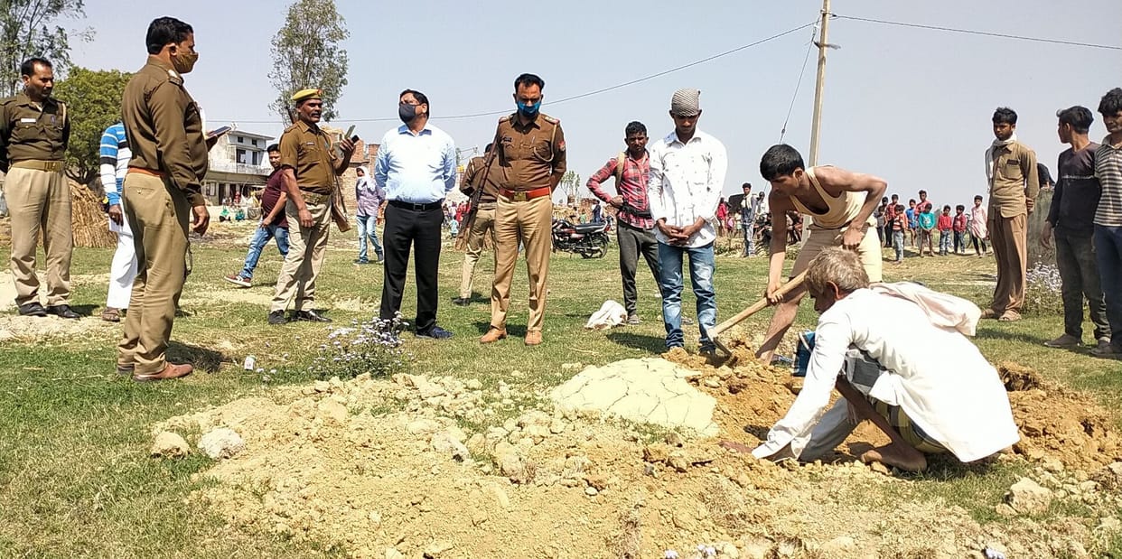 The dead body of a boy extracted from the tomb