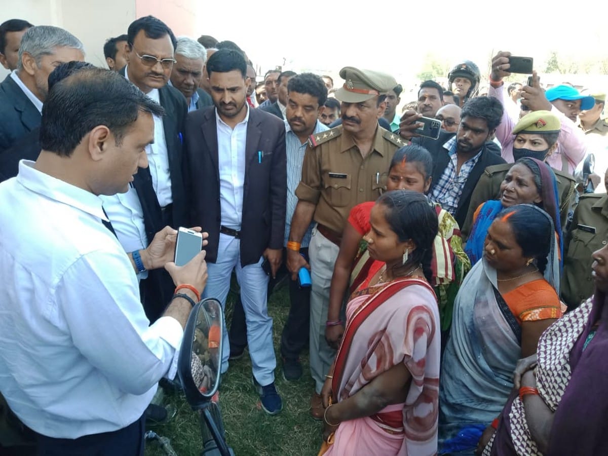 Two real sister climb on water tank for not getting possession of land in bhadohi up
