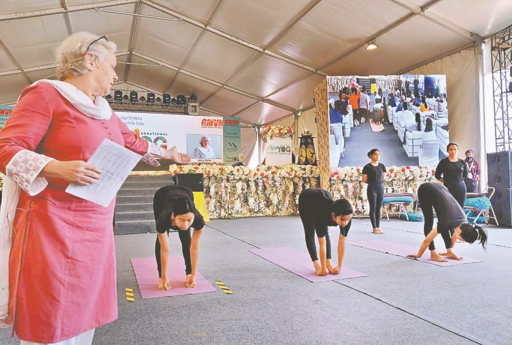 International Yoga Festival 202:  Usha Mata Gives Yoga tips To All Age Group Photos