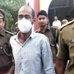 सिद्दीक कप्पन को ले जाती पुलिस