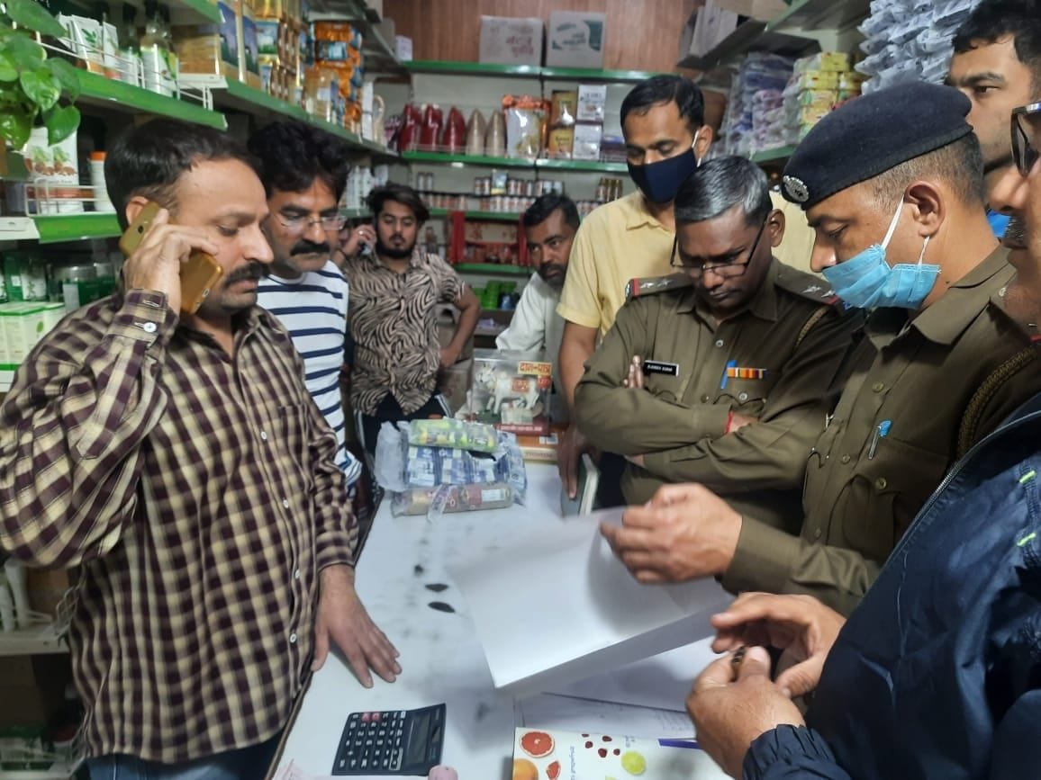 The shopkeeper opened fire on the rogue who came to attack