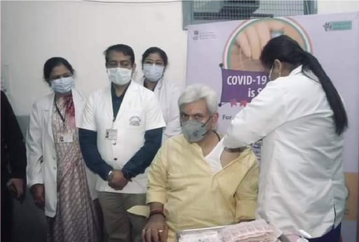 Jammu and Kashmir Lieutenant Governor Manoj Sinha takes his first dose of the COVID 19 vaccine