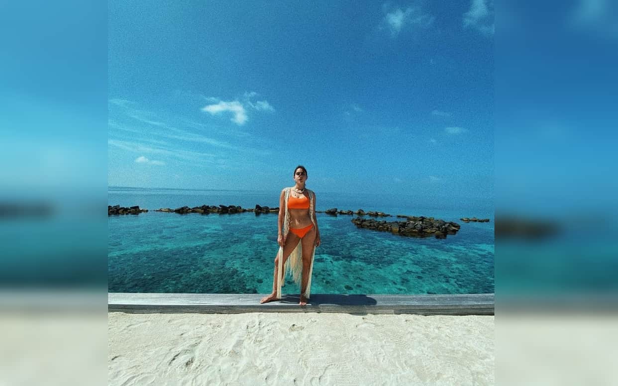 Sara Ali Khan gives daily dose of ‘Vitamin C’, poses in an orange bikini