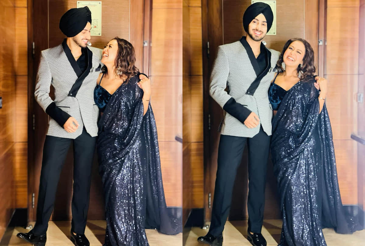 neha kakkar hotness in blue shimmer saree with velvet blouse husband rohanpreet comment on social media