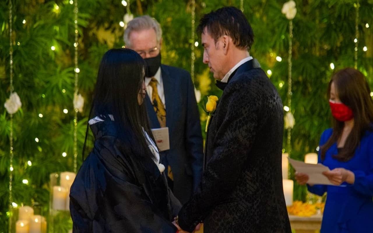 nicolas cage married 31 years younger riko shibata in las vegas shared wedding photos
