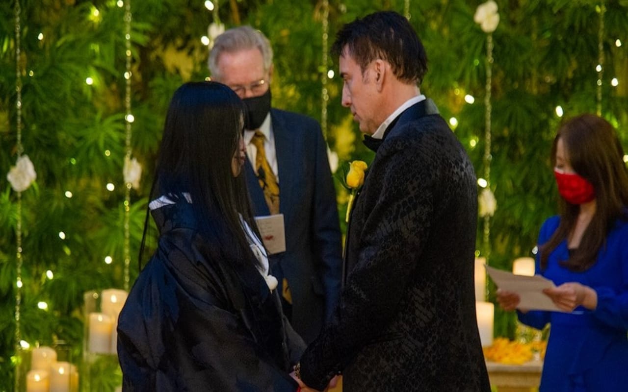 nicolas cage married 31 years younger riko shibata in las vegas shared wedding photos
