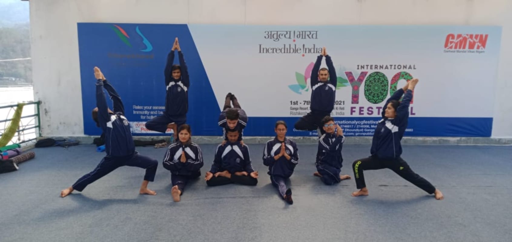 International Yoga Festival 202: flower rain on yoga sadhak in rishikesh