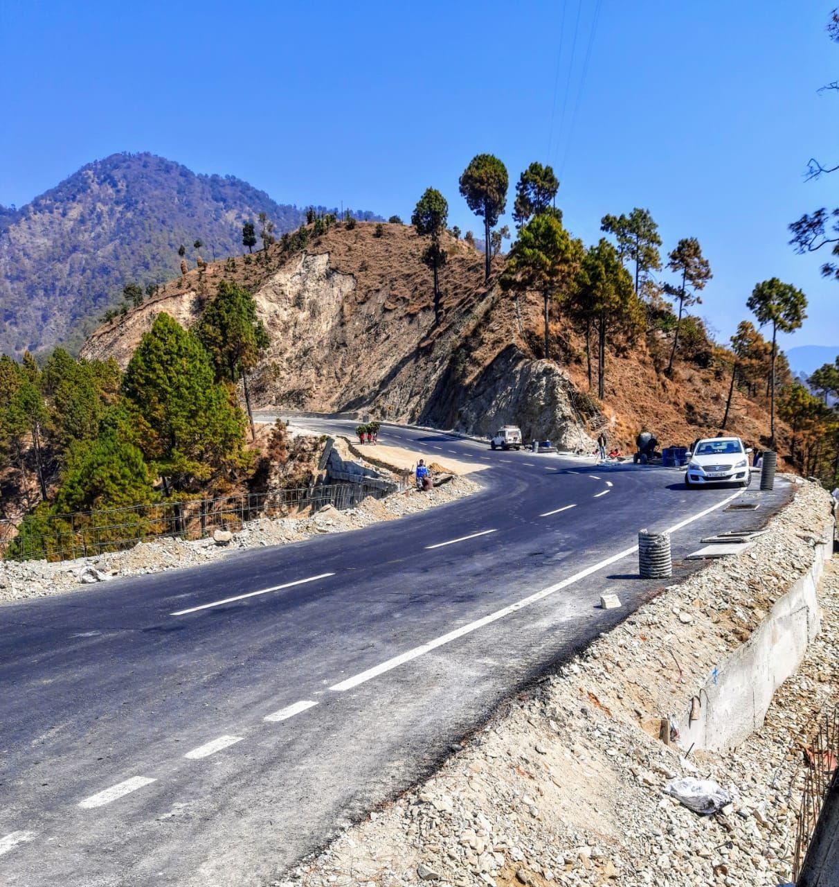Laying of hotmix completed on side valley road in dhoun