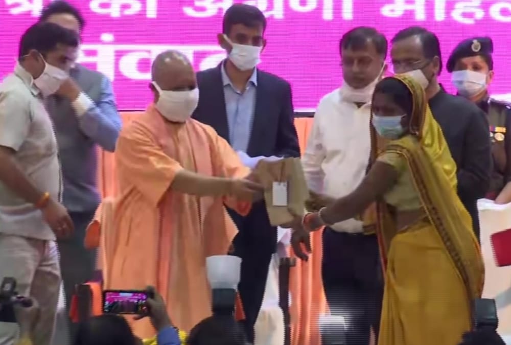 CM Yogi Adityanath honours women on international Womens day.