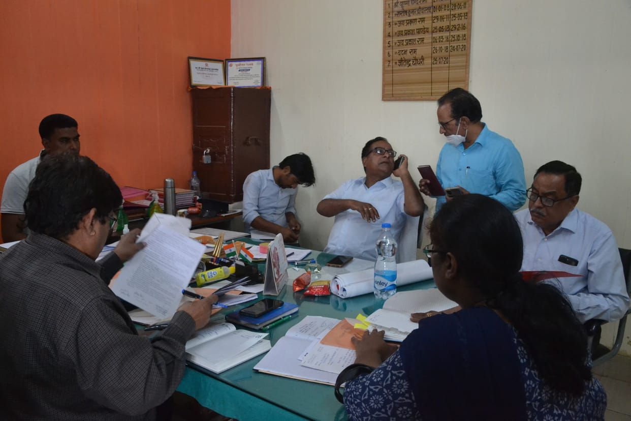 Senior DFM examines the documents