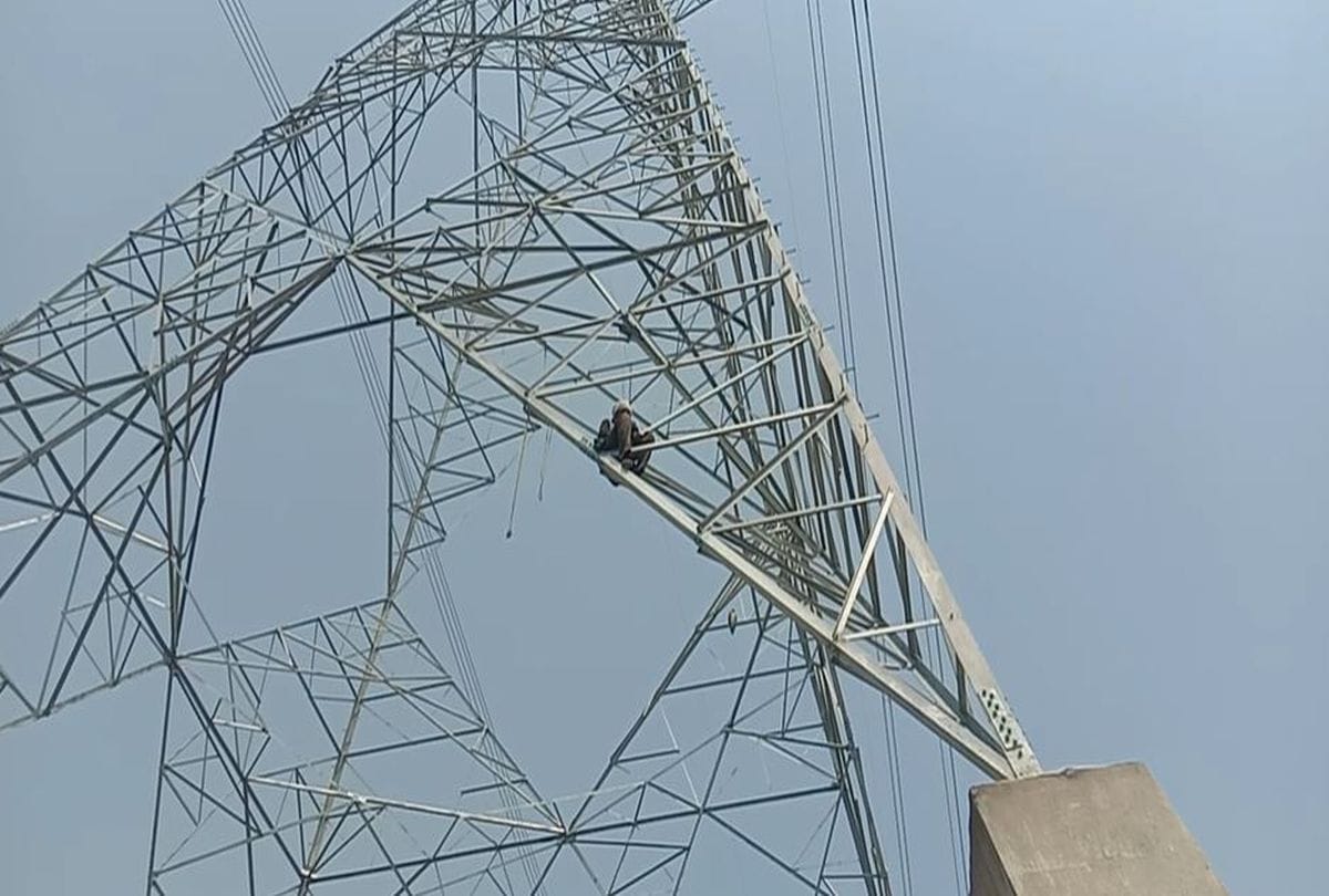Farmer Saw Destroy Crop Climp On High Tension Line Tower