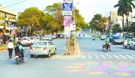 Minister, just two days before your arrival, the Corporation decorated the Model Road