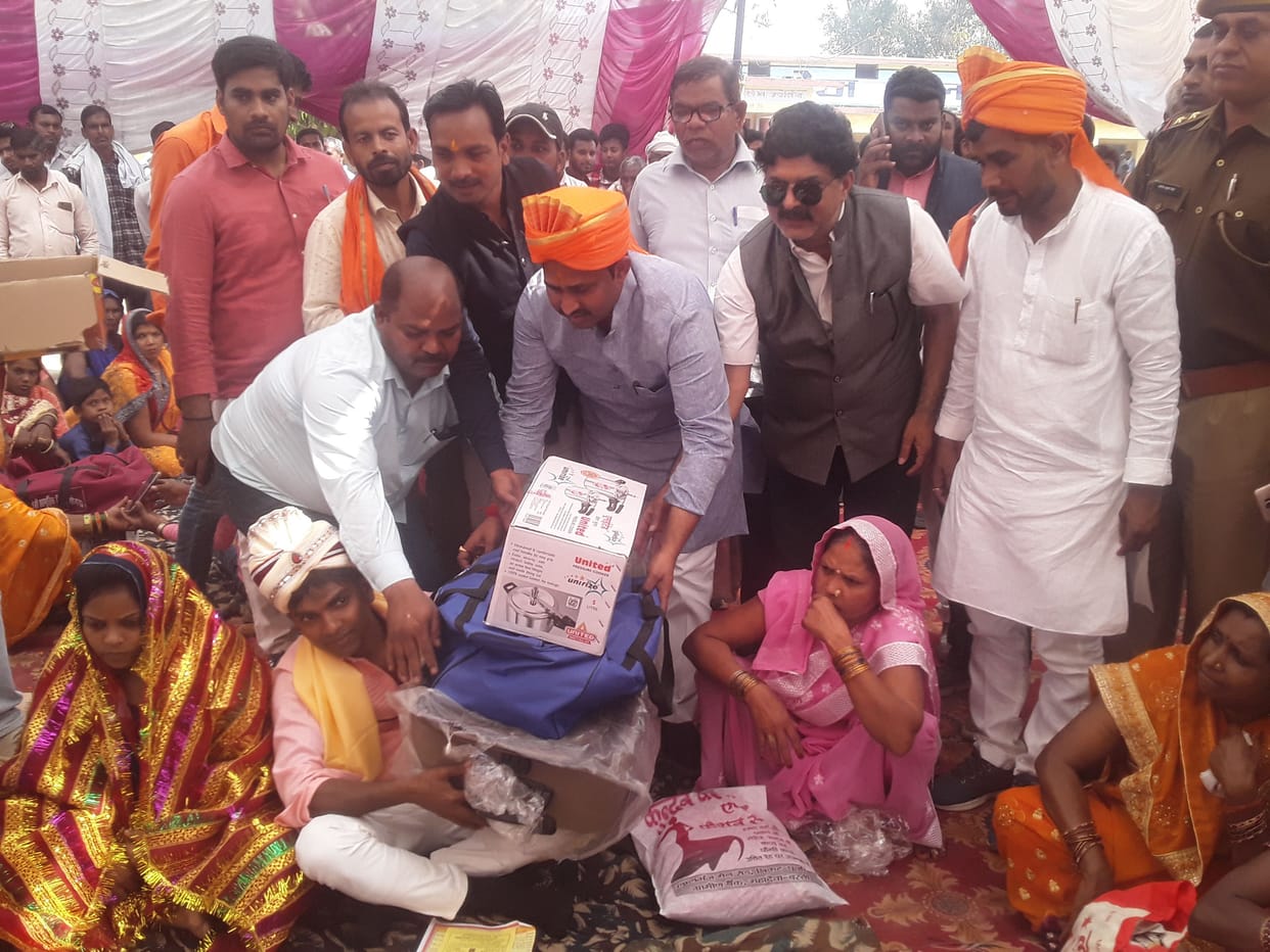 99 couples tied up in mass marriage