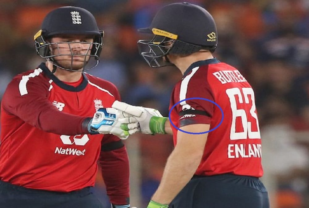 England players wear black armbands in memory of Joey Benjamin