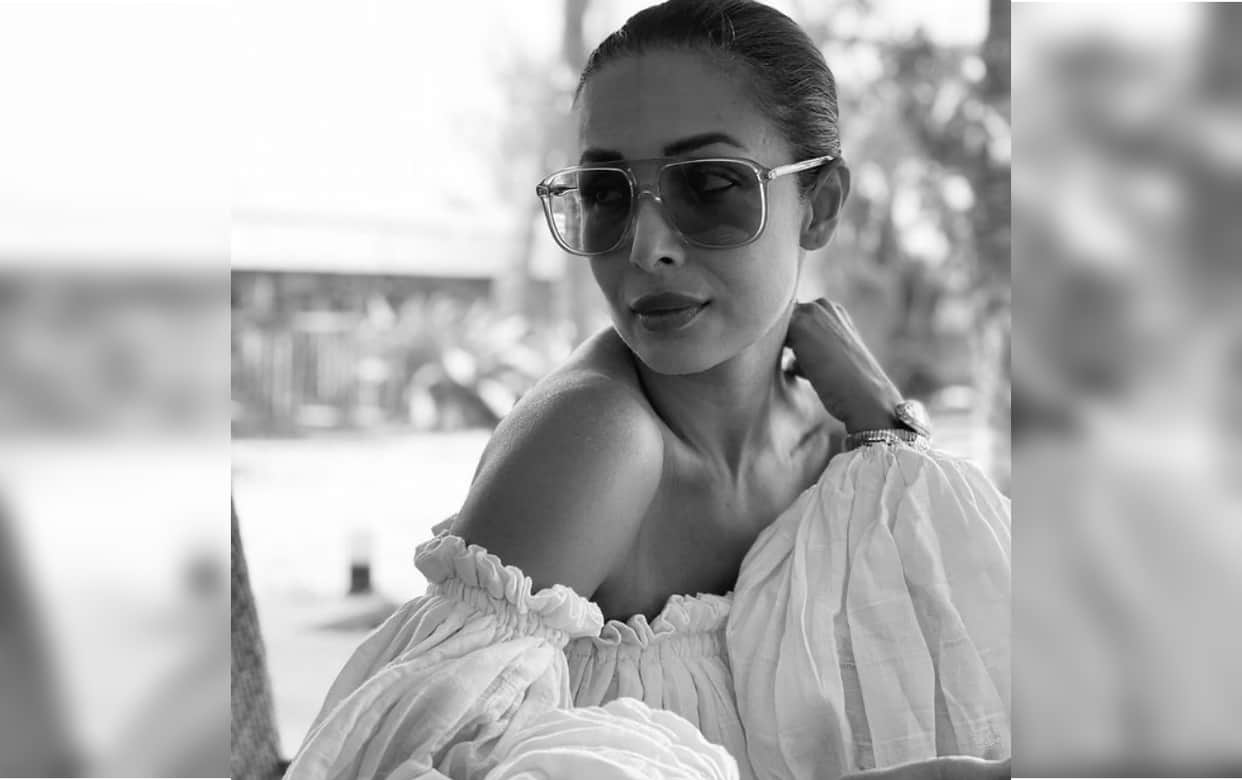 malaika arora spot with son arhaan khan in olive green maxi dress that backless design grab attention