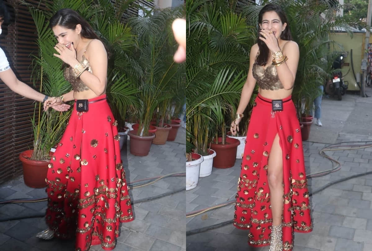 sara ali khan show hotness in red thigh high slit skirt with golden bustier