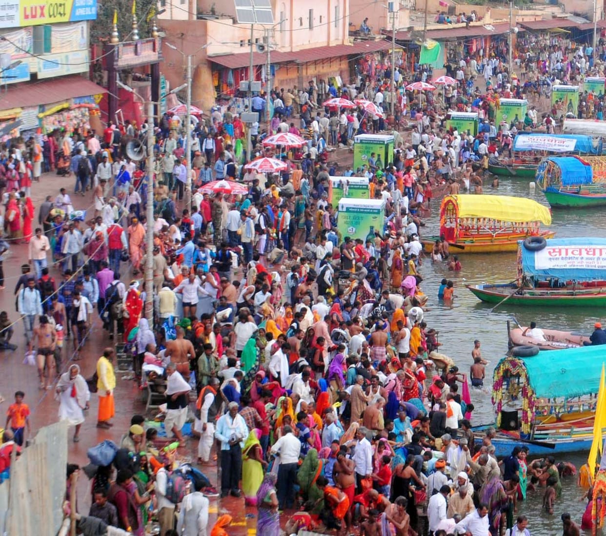 Devotees take a dip in Mandakini on Amavasya