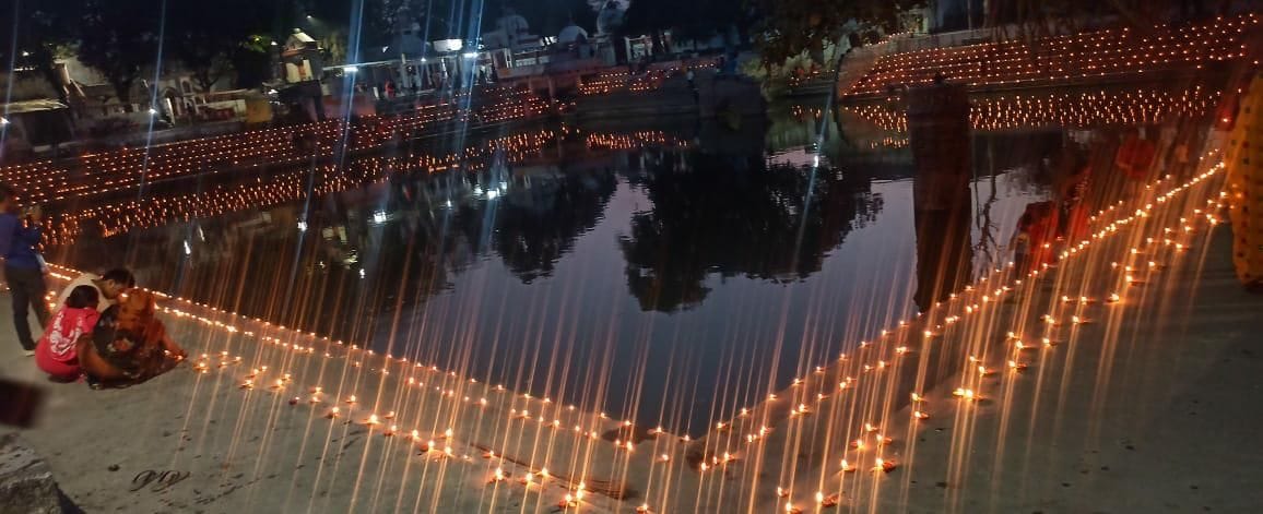 The lake rises as hundreds of lamps light up