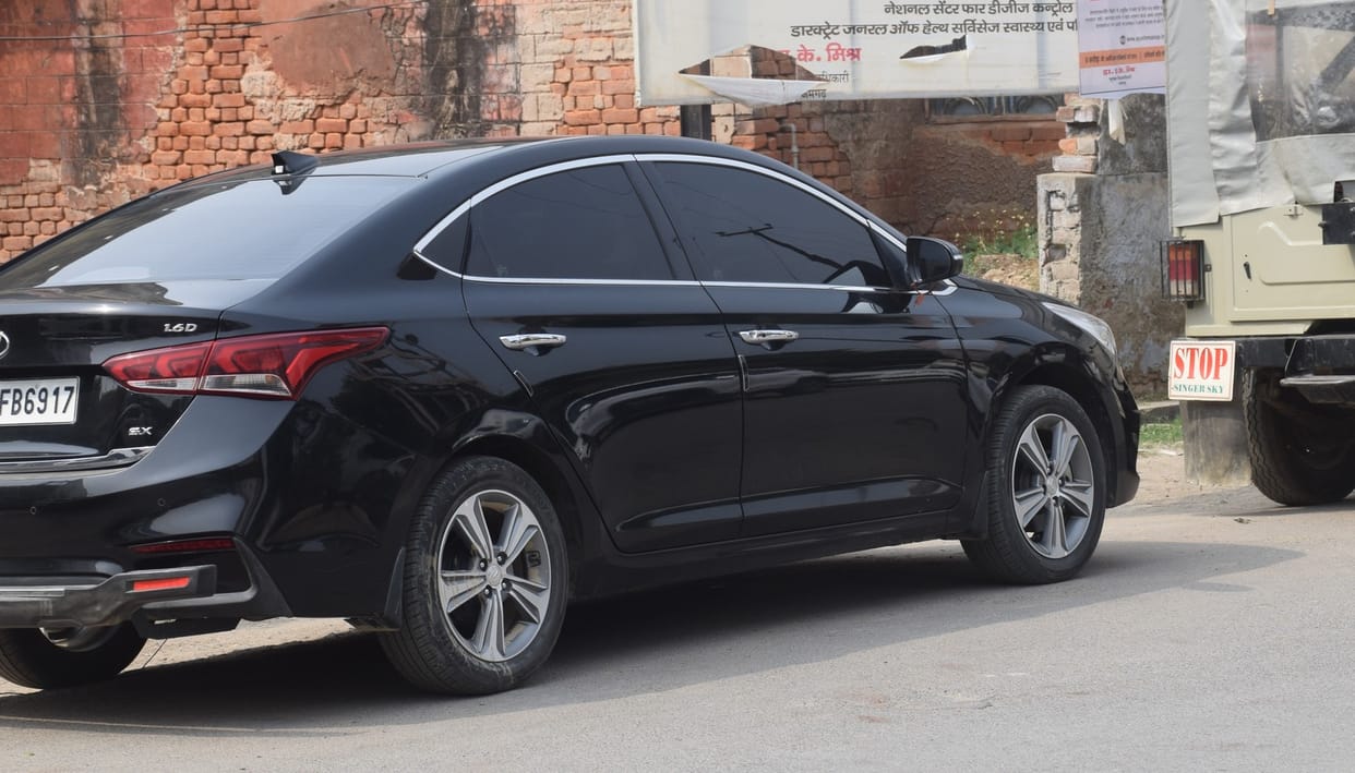 Black glass vehicles running fearlessly in the city