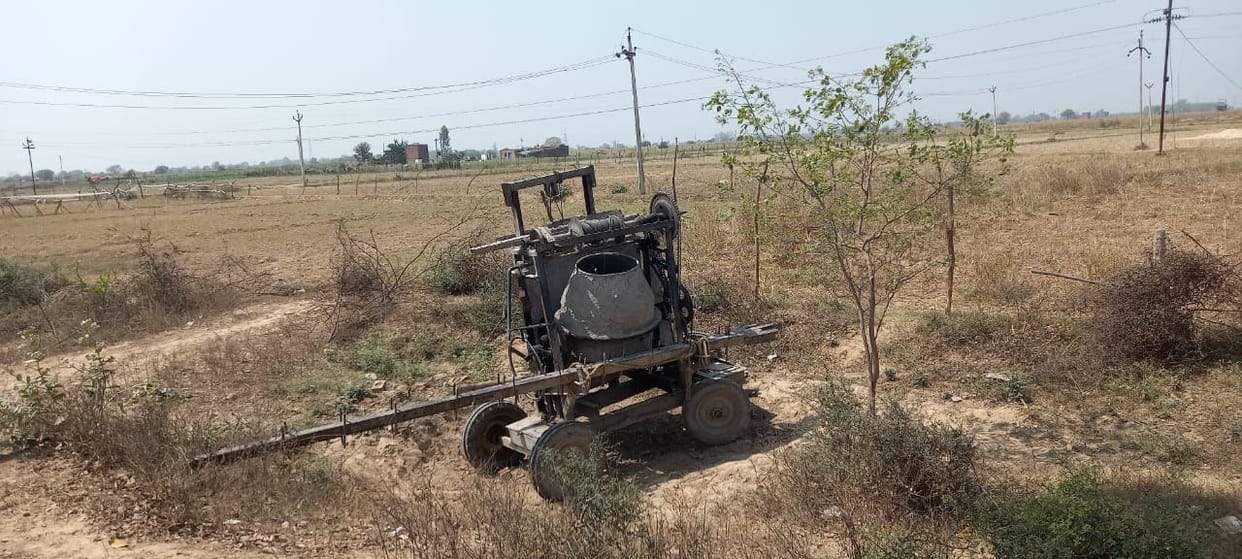 Worker killed, four injured due to overturning mixer machine