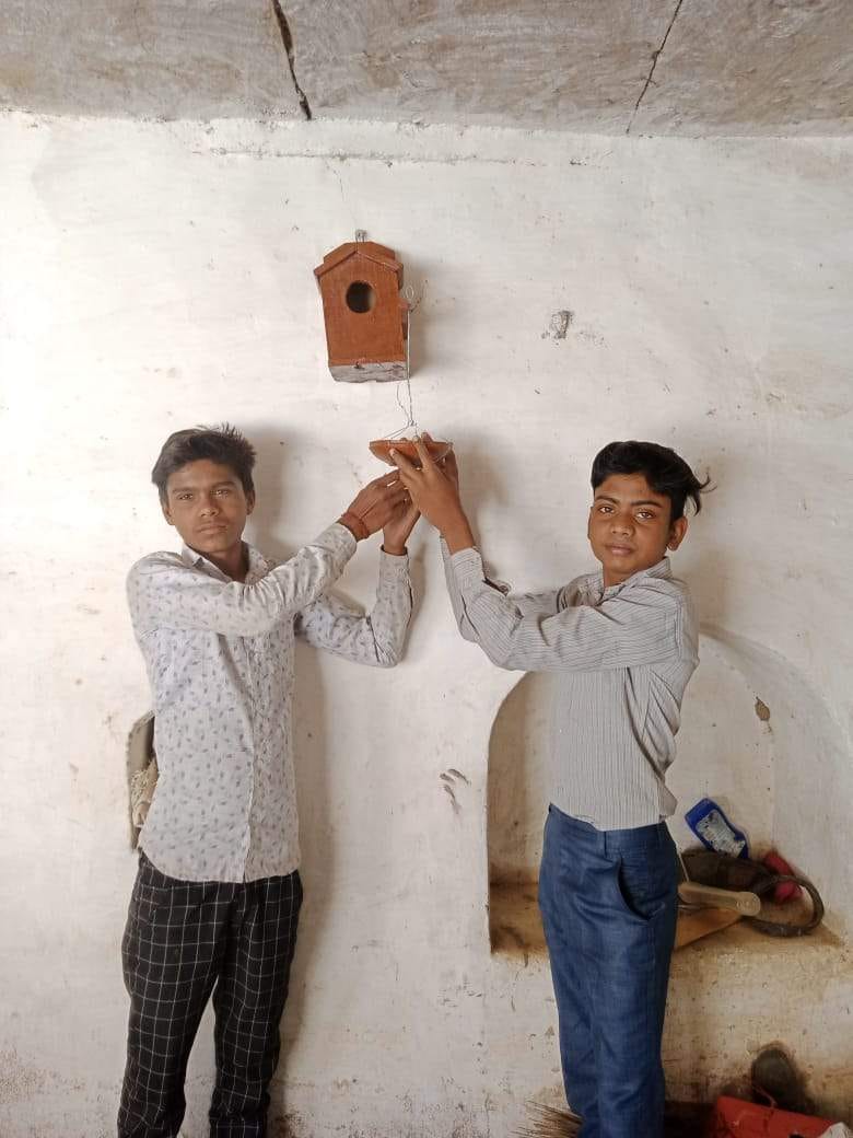 children participated in sparrow saving campign