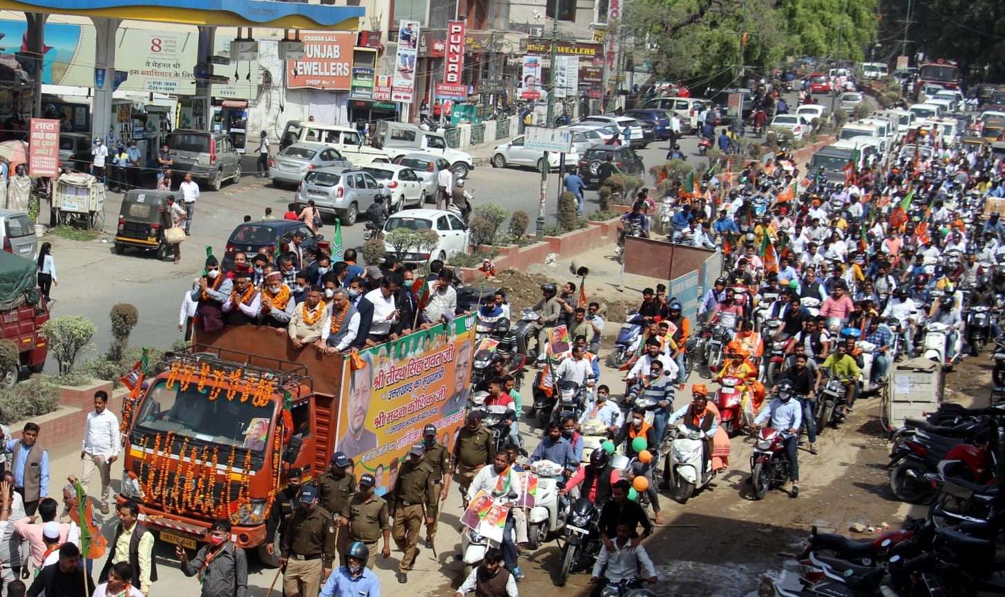 uttarakhand news: bjp welcome bike rally for cm tirath singh rawat and madan kaushik photos