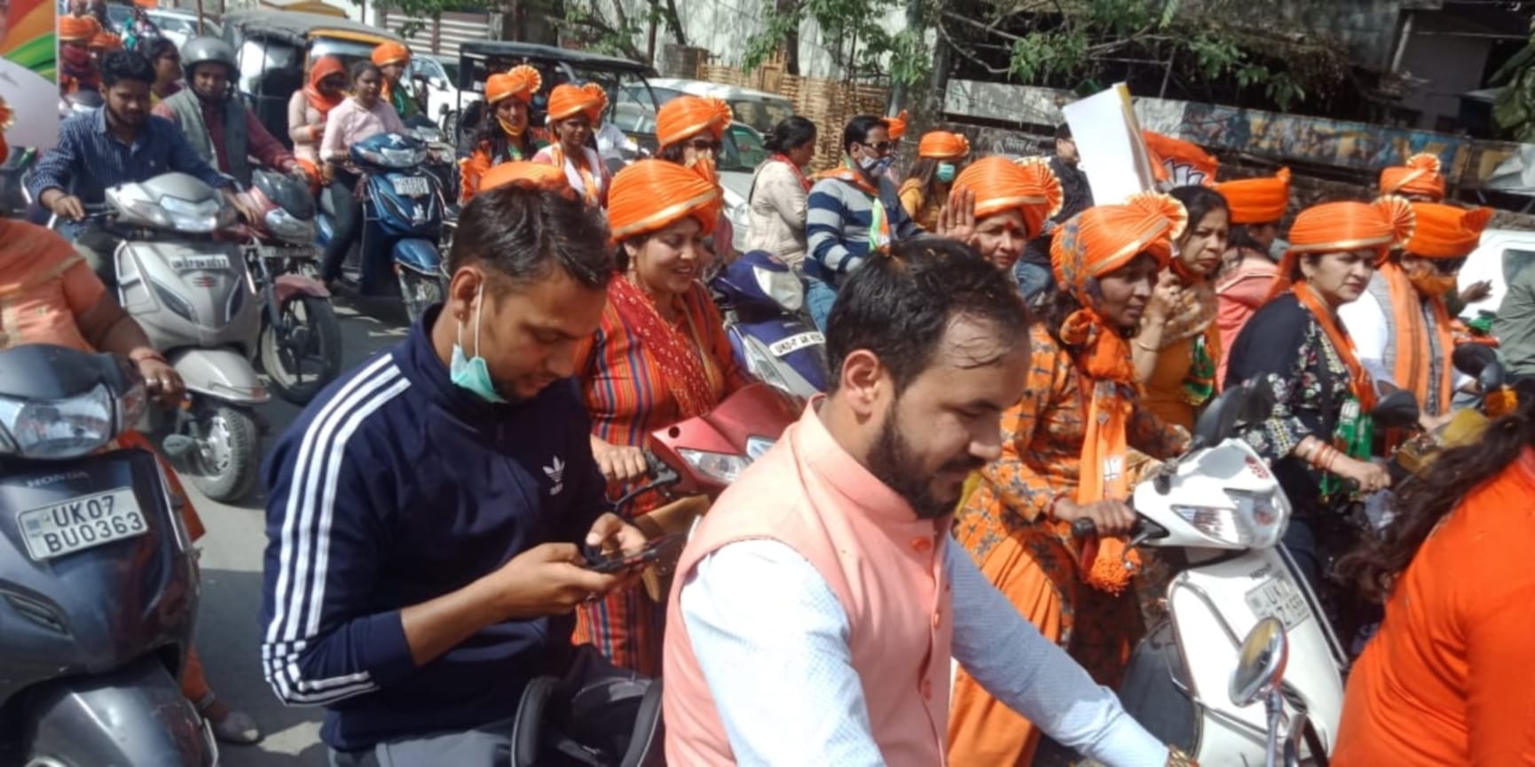 uttarakhand news: bjp welcome bike rally for cm tirath singh rawat and madan kaushik photos