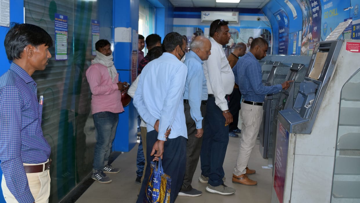 Bank closed, ATM too empty, people wandering