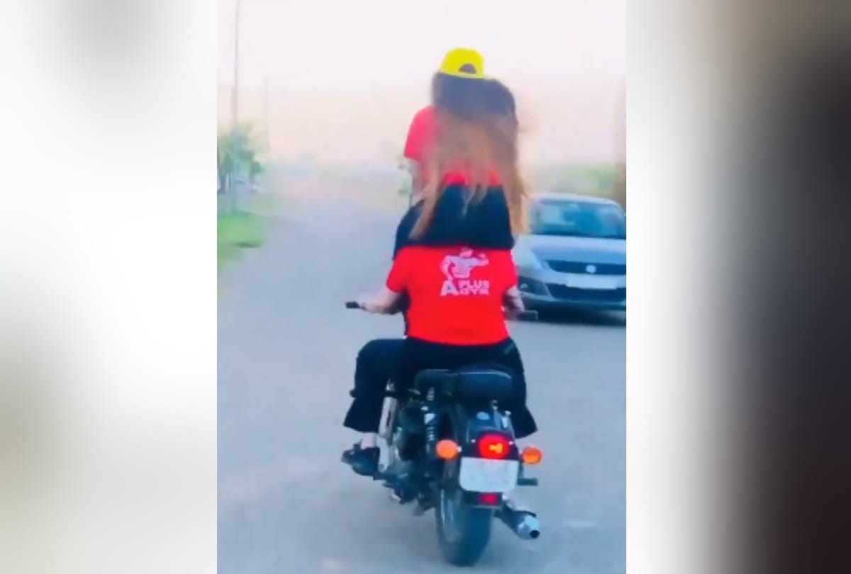 ghaziabad two girls stunt on bullet video goes viral police e challan of 11 thousand