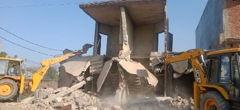 BDA runs JCB on illegal plotting