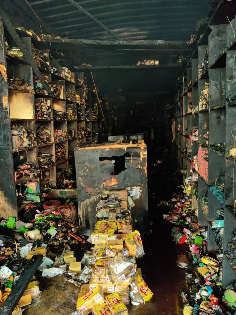 fire in shops, goods burnt, fire brigade