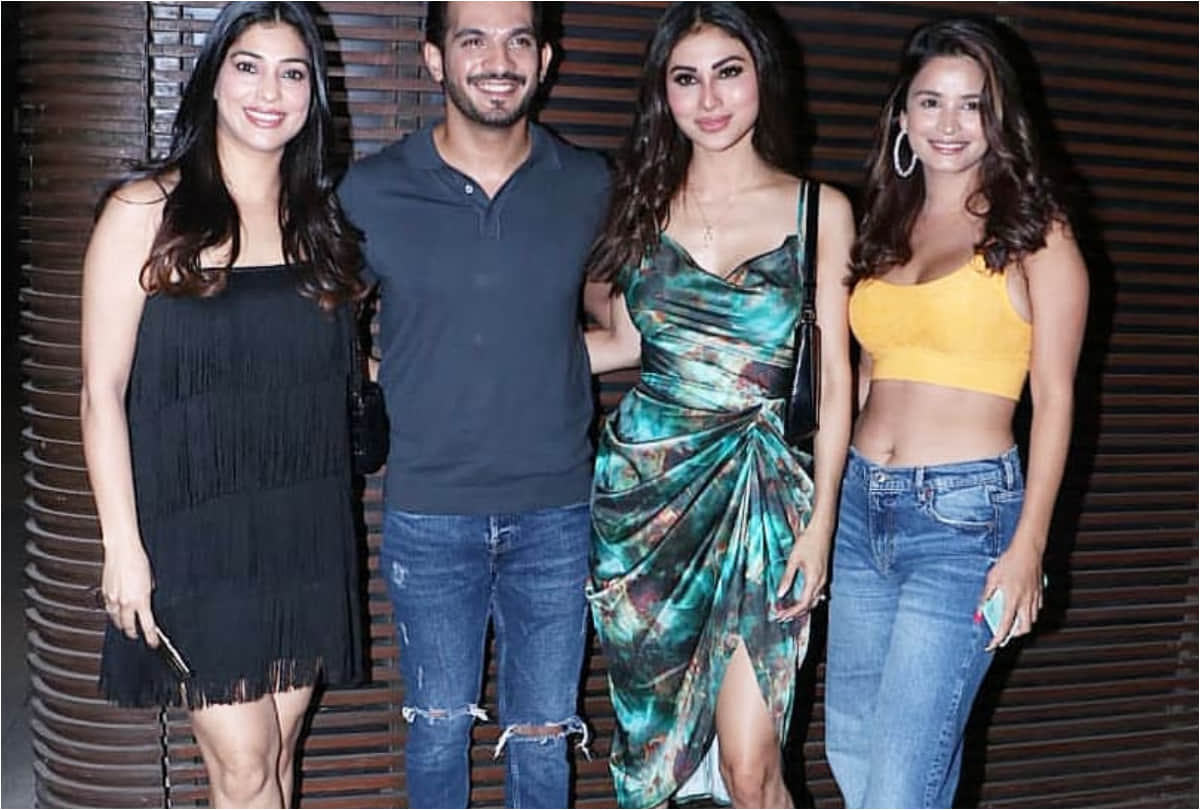 mouni roy flaunts figure in body fitting navy blue vertical stripes dress in her recent outing