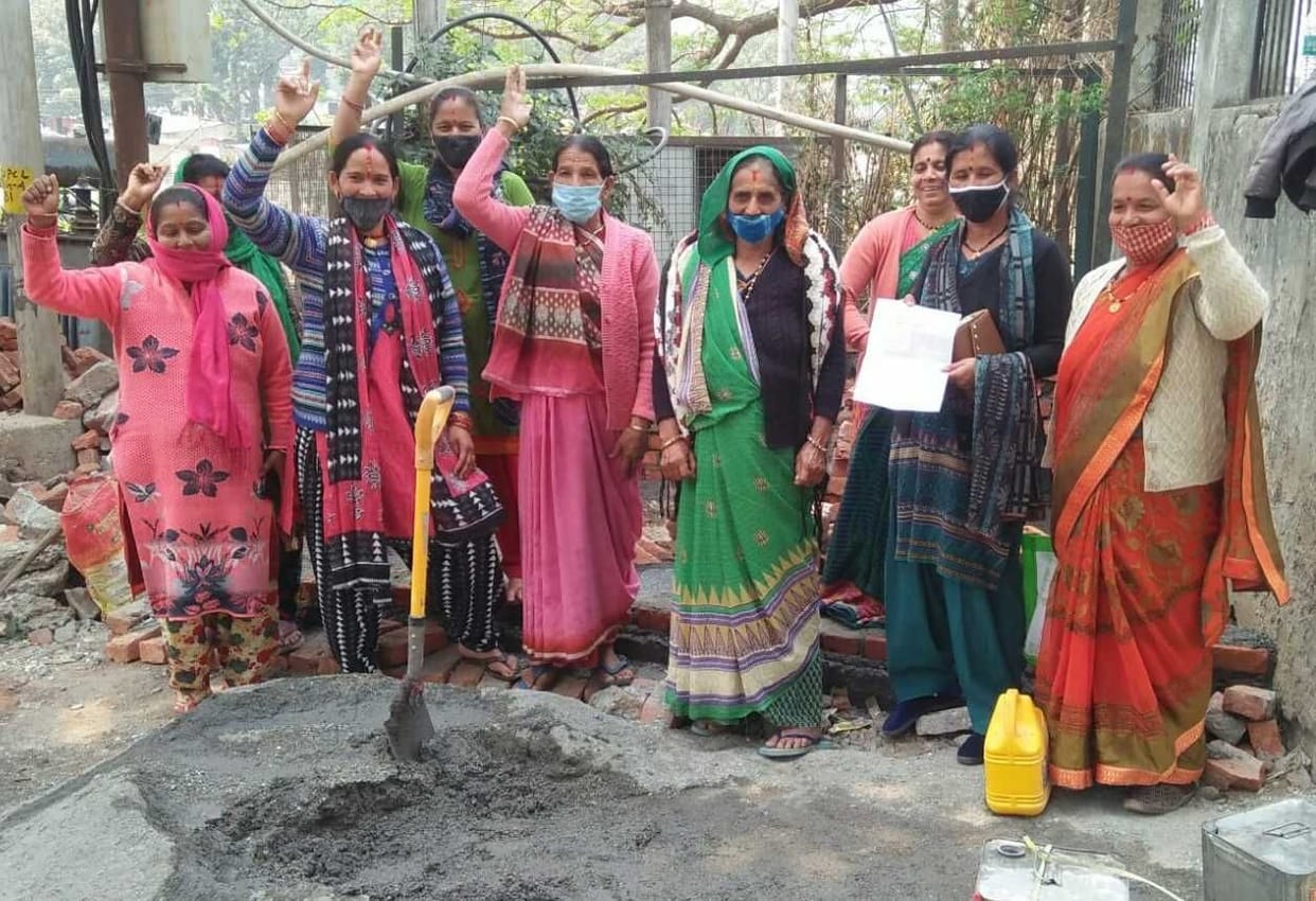 Women came out in protest against making dustbin near the temple