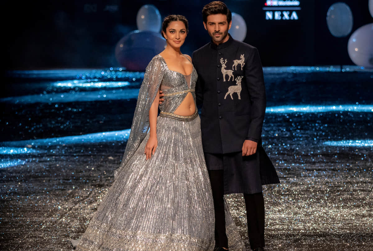 kartik aaryan protects kiara advani from cameras as she fixes her short dress people remember sushant singh rajpoot