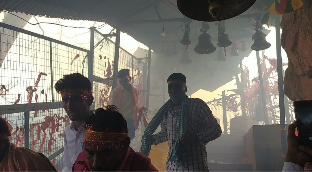 A stampede by fire on the hill of the main temple of Purnagiri
