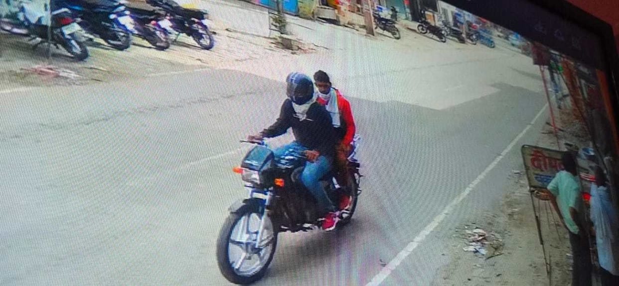 CCTV footage of bike riders snatching 49 thousand rupees from woman released