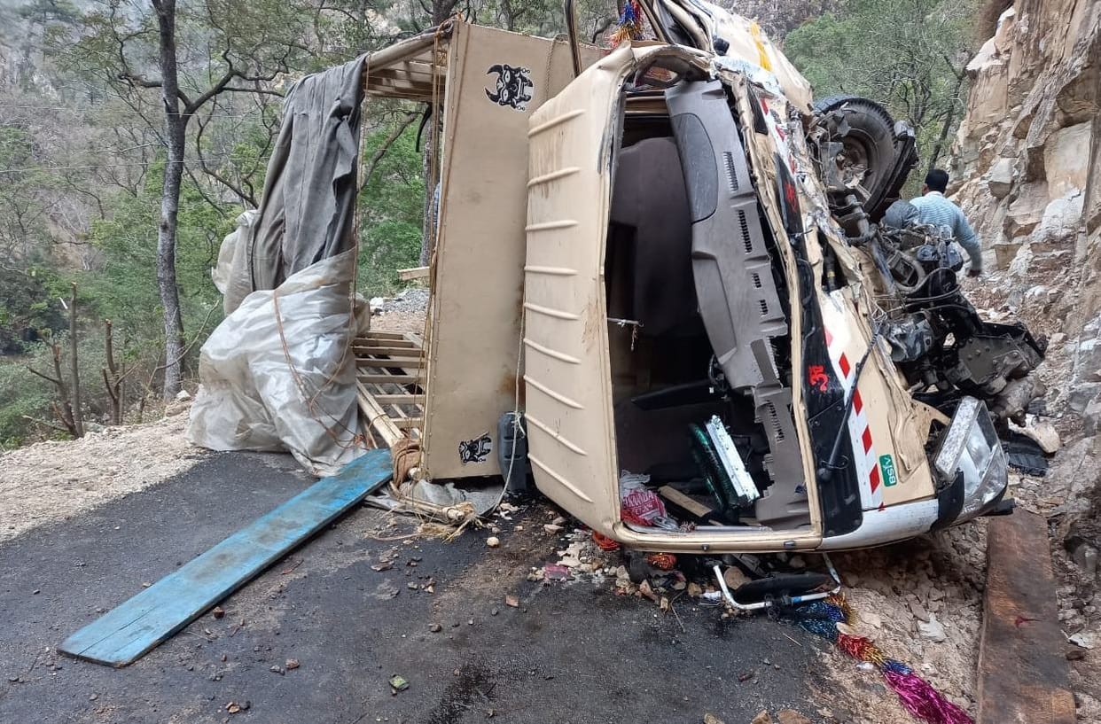 The vehicle overturned on the road after hitting a cliff
