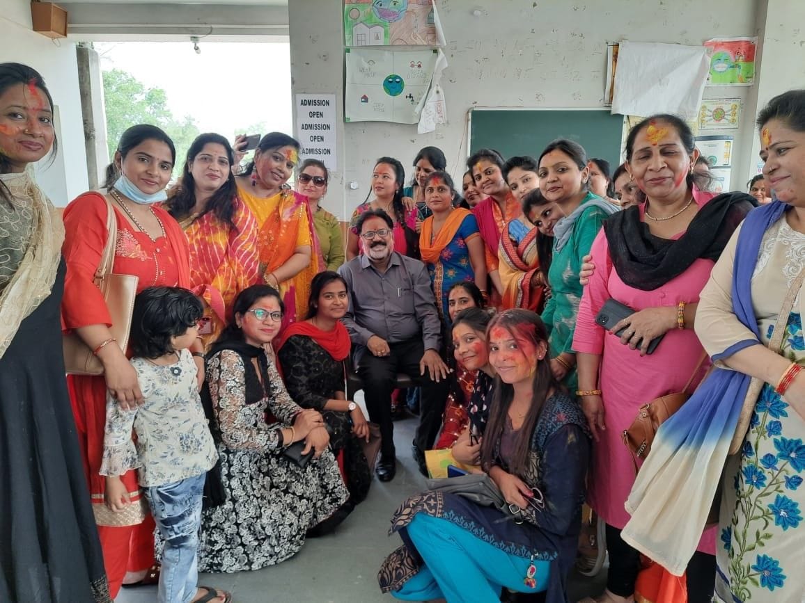 Hathras: welcomed by a shower of flowers, greeted with gulal
