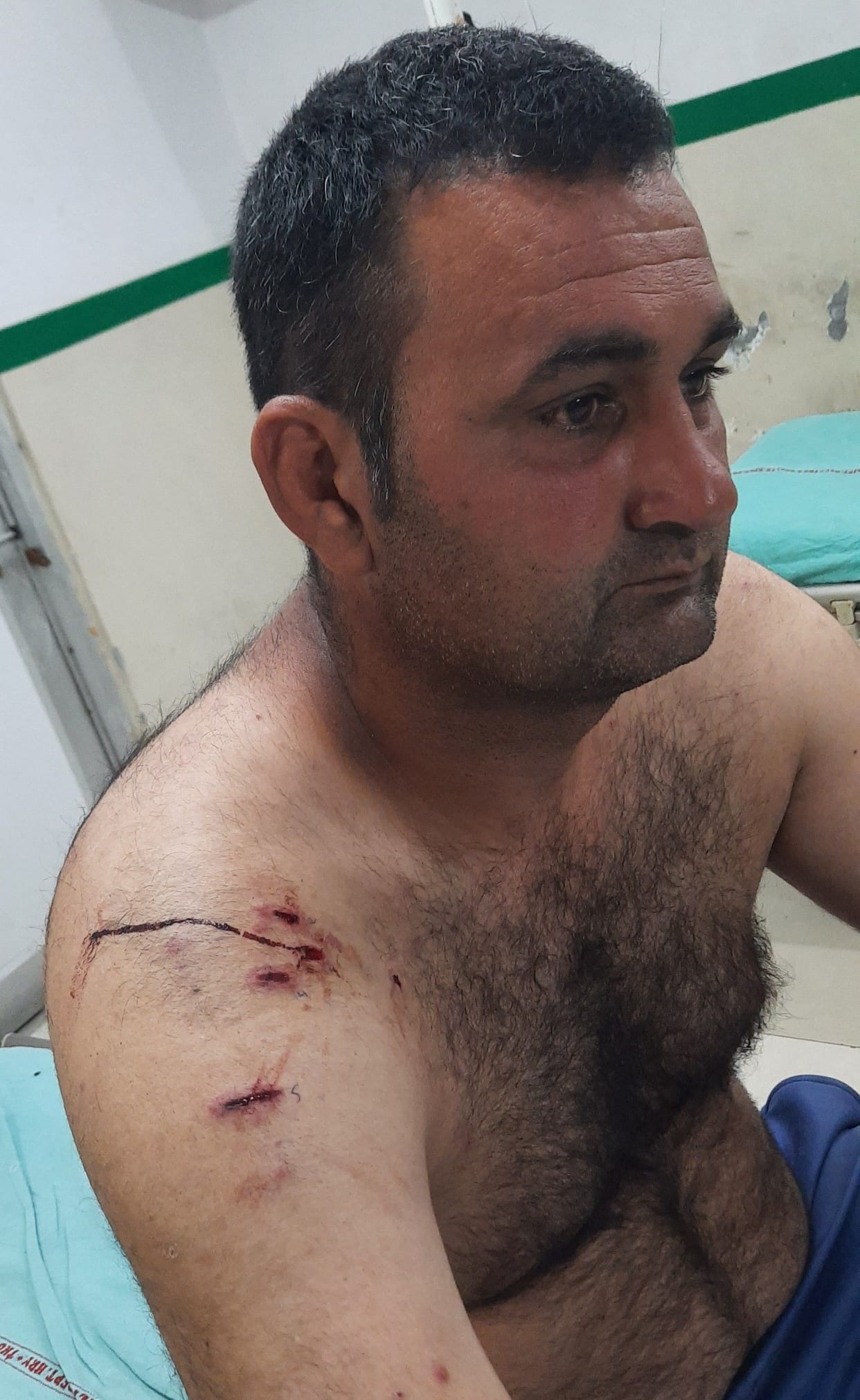 father firing on son, son injured, police case file