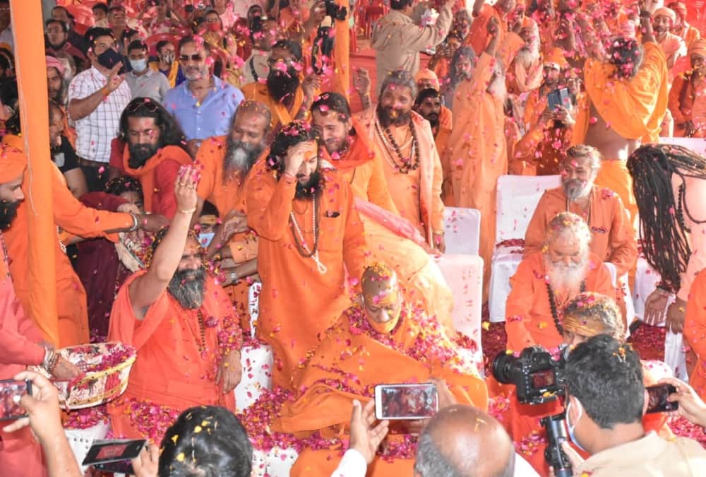 Haridwar Maha Kumbh Mela 2021: Saints Play Flower Holi Celebration in Niranjani Akhara photos