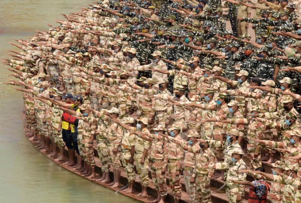 Haridwar Mahakumbh 2021: Police and paramilitary forces Take oath of safe Kumbh on Har Ki pauri Photos