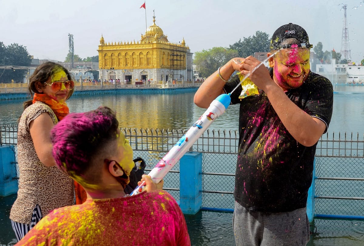holi celebration in india, see pics from diffrent cities and states, holi pictures, images, videos