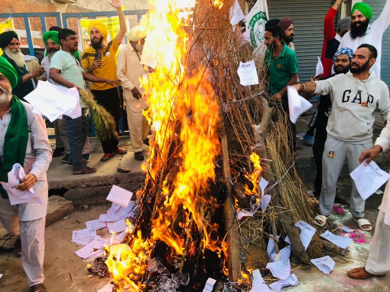 farmers protest, holika dahan, agriculture law